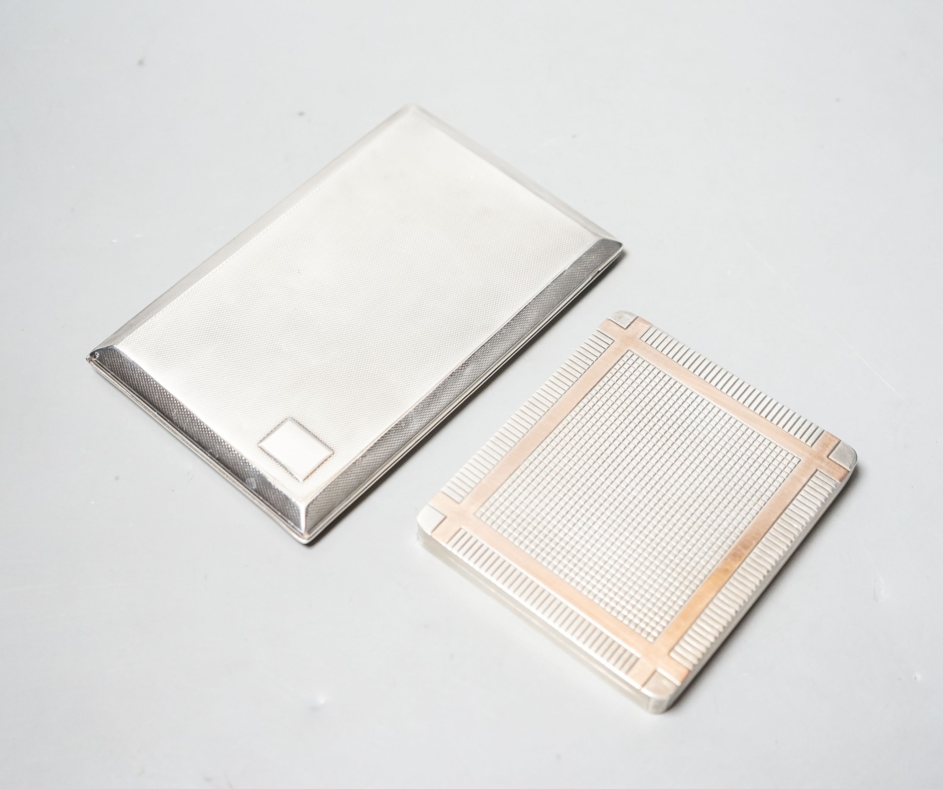 A George VI silver and yellow metal banded square cigarette case, London, 1950, 92mm and one other cigarette case, gross 3.4 grams.